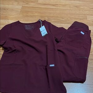 Maroon FIGS set — two pocket top and high waisted cargo pants